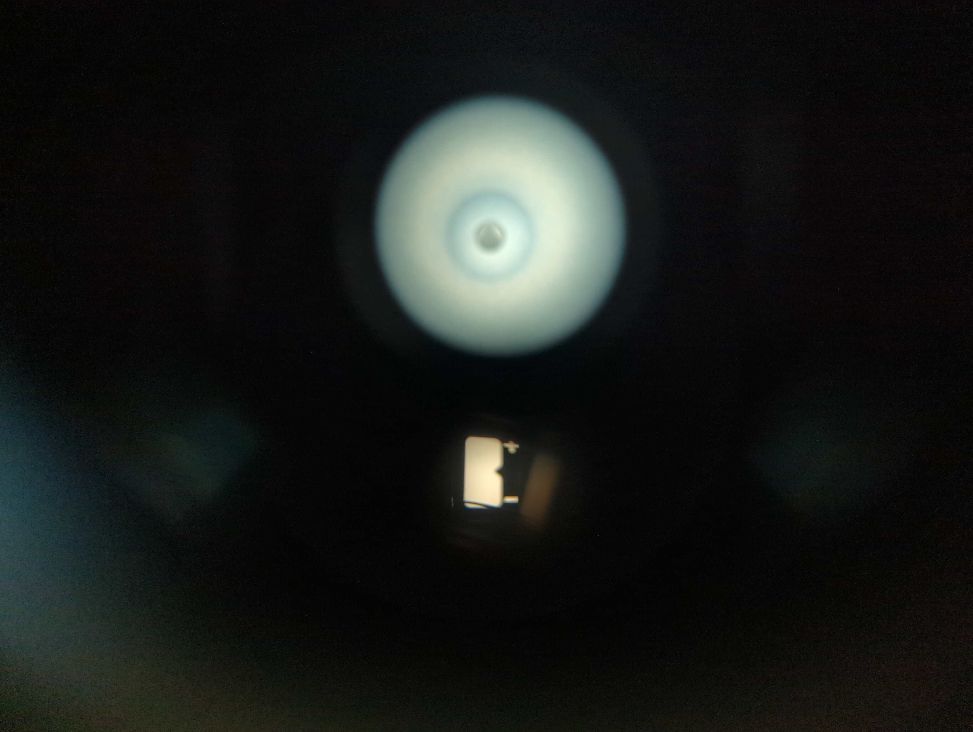 Pentax 6x7 viewfinder through a Barska 60800 telescope, with notable vignetting